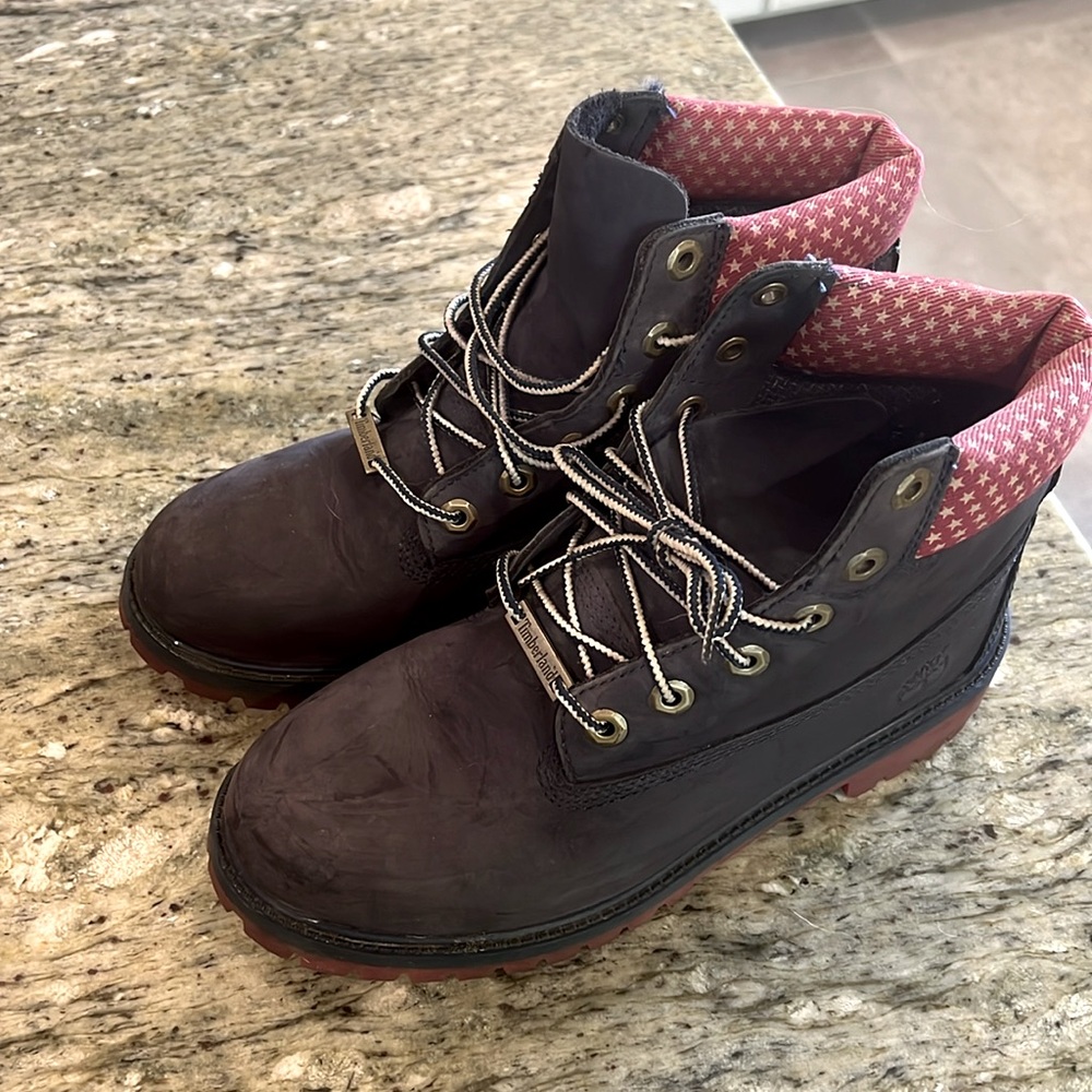 Timberland leather boots navy with red and white stars on ankle. Size M 7/ EU 40